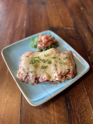 Enchiladas: 4 tortillas rolled with whipped queso spread, protein, all smothered in salsa & topped with melted Chihuahua cheese!