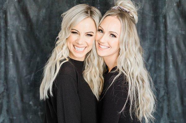 Two blonde best friends displaying their long blonde locs.