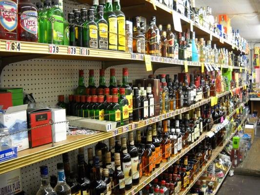 Vercher's Central Liquor Store's back wall filled with Liquor