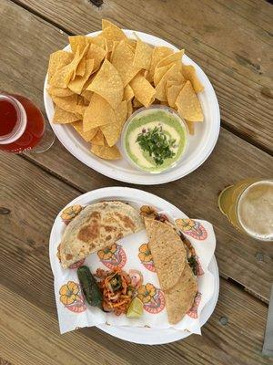 Bean and cheese tacos with chips and queso