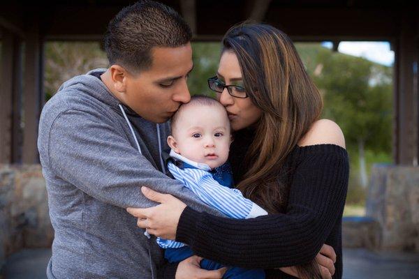 Kisses for the baby. Photographed in Santa Clarita, CA.