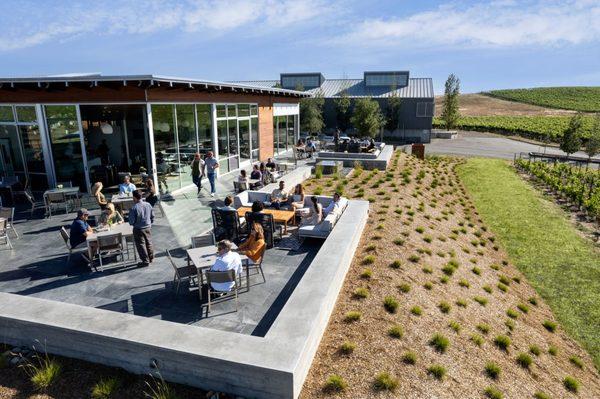 Patio seating from our scenic tasting room features panoramic vineyard views