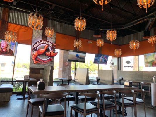 Dining area. Super clean and spacious! Lots of TVs for different games.