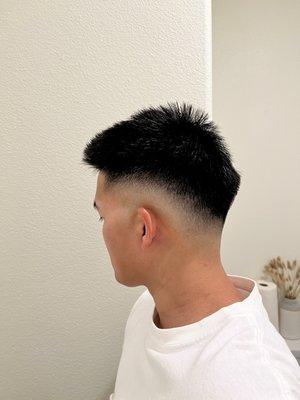 Haircut by Sergio - Mid high fade with textured top