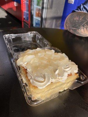 Tres Leches cake slice with lychee topping.