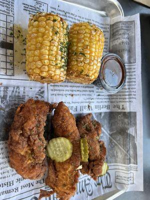 3 piece strips and fried corn.