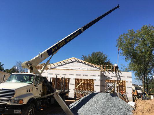 Setting roof trusses