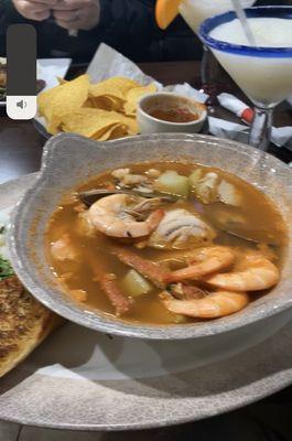 This is the 7mares soup...mussel, shrimp, crab, fish, imitation crabmeat, scallop...drawing a blank on what 7th seafood...