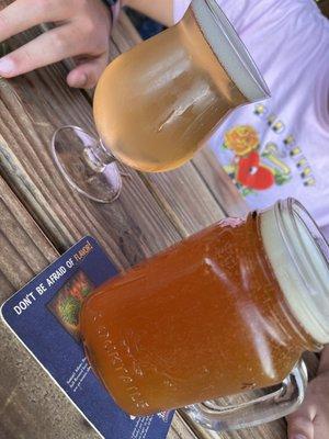 skiff mango hard seltzer [left]; honey hudson ale [right]