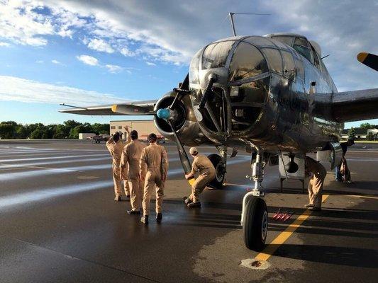 Crew getting the B-25 ready for flight