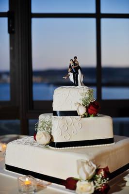 Our cake was beautifully decorated without looking overdone with the flowers. I love the simplicity.