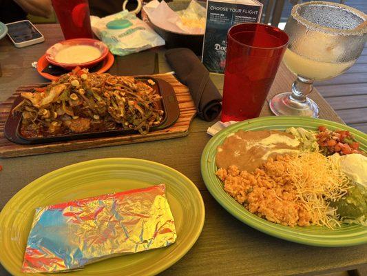 The Tex-Mex Fajitas with chicken, chorizo, shrimp and corn - so delicious with great portions. The frozen margaritas were delicious.