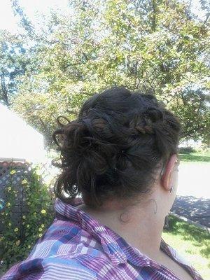 Back shot. Side braids into bun.