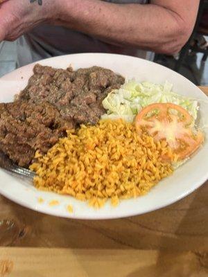 Carne guisada, rice and beans