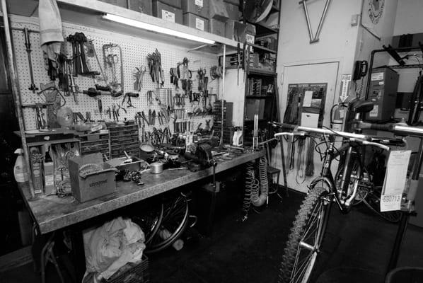 Black and white shot of where they fix bikes.