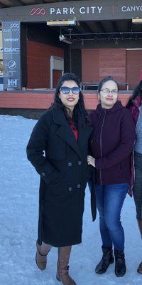 Business Owner, Sabina(black coat) & Kapila (maroon sweater)