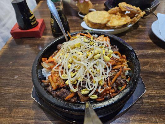 Bulgogi bowl with sweet potato tempura in the background