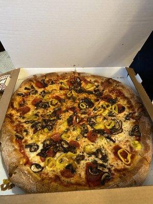 Create Your Own Pie Banana Peppers, pepperoni, and mushrooms