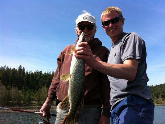 Cal and his first pike with Guide Matt