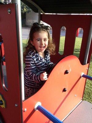 Playing on the beautiful preschool playground.