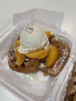 Peaches and Vanilla Bean ice cream Funnel cake.