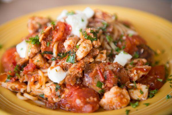 Our staff's favorite - sausage, chopped plum tomatoes, fresh mozzarella cheese tossed with pasta.