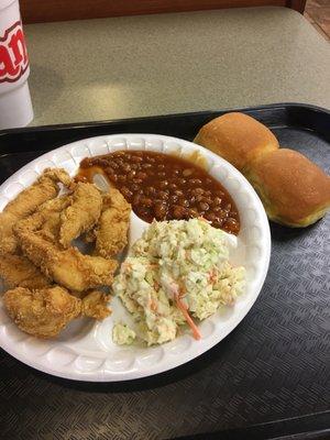 6 piece hand breaded chicken tenders meal with baked beans and coke slaw.