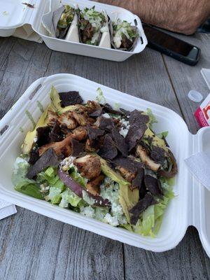 Chicken Green Goddess salad. Delicious. The onions were a ring and difficult to cut without a knife, so you could enjoy with each bite.