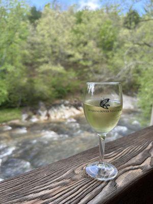 Glass of wine with river view