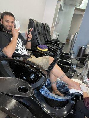 My boo loved his first ever pedicure by Henny.