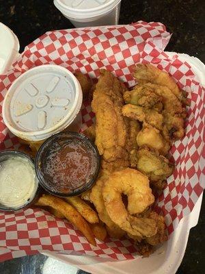 Pick 3 combo! Fried grouper, oysters, shrimp with Cajun fries and red beans and rice! $16