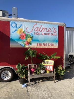 Look for Jaime's Local Seafood Shack under the bridge mainland side of Theo Barr's Bridge