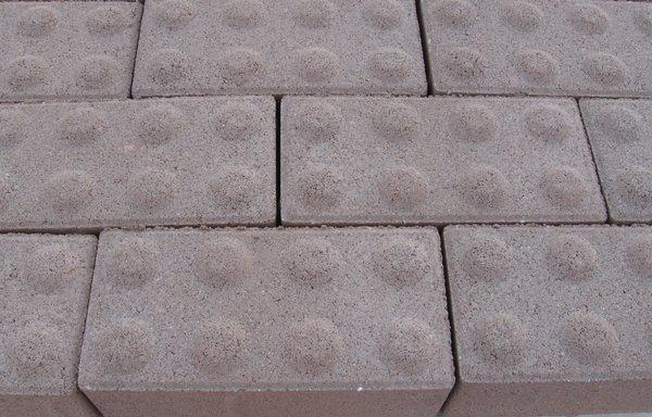 Handicap pavers have warning bumps, 8x4x16 (Holland paver size)