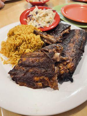 Ribs, curried rice, and slaw. Best ribs on the island.