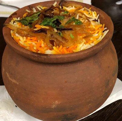 Pot Biryani- slowly cooked house flavored biryani in earthened pot adds special flavors that you will never forget.