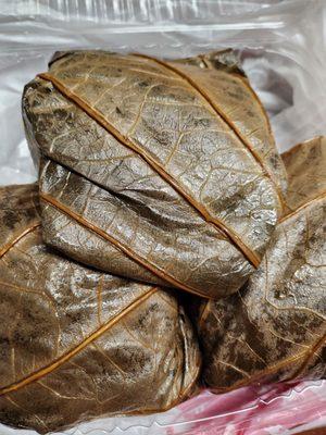 Buy 2 get 1 free before the store closed $5.80 each pork sticky rice in lotus leaves