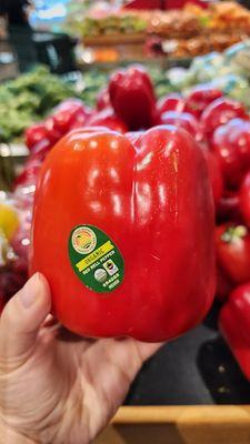 whoke foods passing left over NON-ORGANIC produce as organic. The pepper is twice the size of an adult arm.