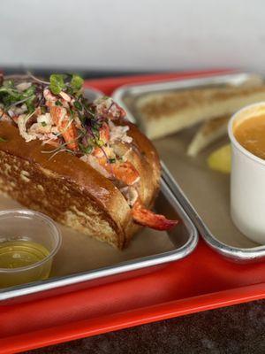 connecticut style lobster roll and a cup of bisque