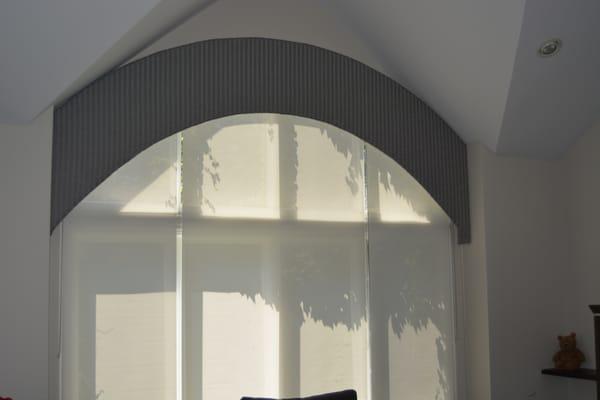 Custom Curved Upholstered Cornice with Solar Shade