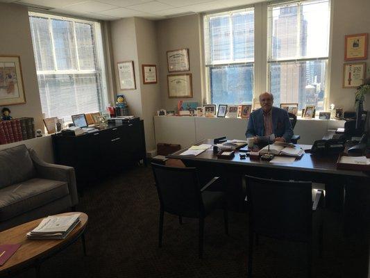 Guy I. Smiley, Esq. at his desk