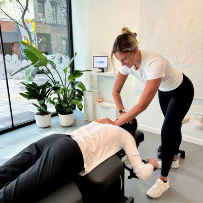 KIRO doctor performing a chiropractic adjustment on a patient.