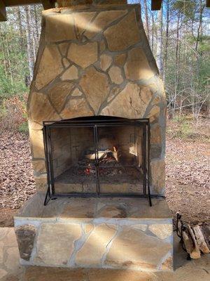 Fireplace outdoors where the main seating area is