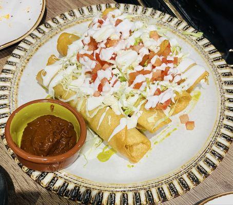 Chicken flautas / tacos dorados.