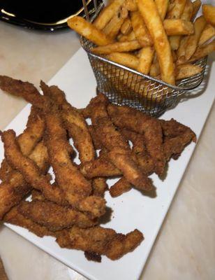 Homemade chicken fingers and fries