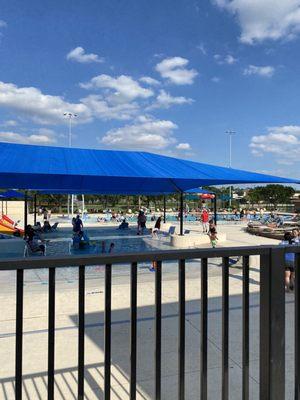 Covered wading pool and bigger pool in background