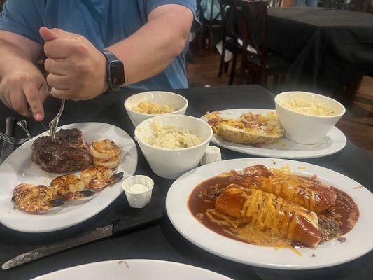 The couples Ribeye, enchiladas , Mac and cheese, Alfredo, baked potatoe, scallop potatoes