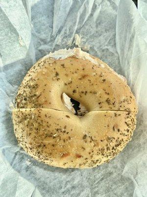 Rosemary bagel with salmon cream cheese