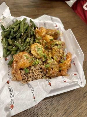 Bang bang shrimp and chicken with green beans and fried rice.