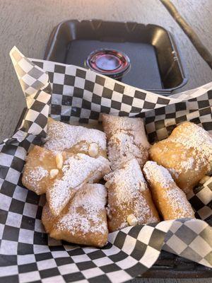 Beignets that technically don't need any sauce, but were very tasty with the strawberry glazed I ordered.