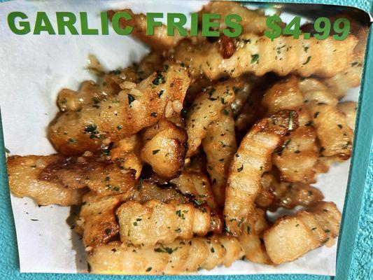 Garlic fries $4.99, regular fries $4.50 as of March 2024.